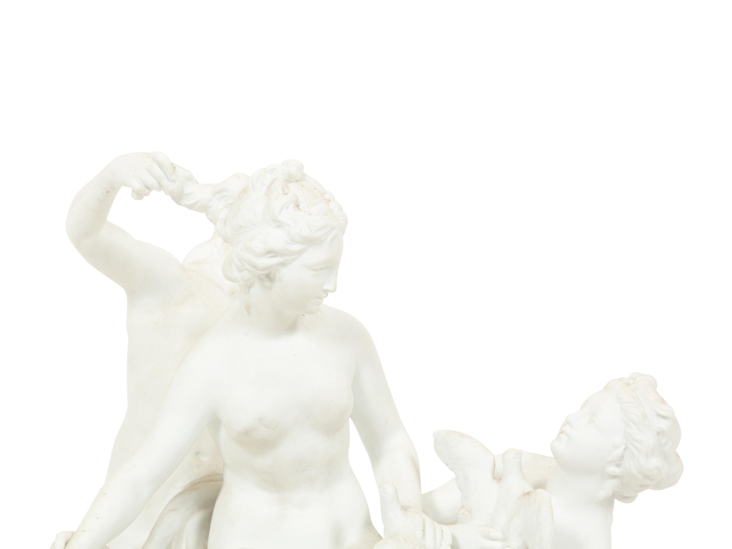 A Sèvres Bisque Porcelain Toilette de Venus Figural Group