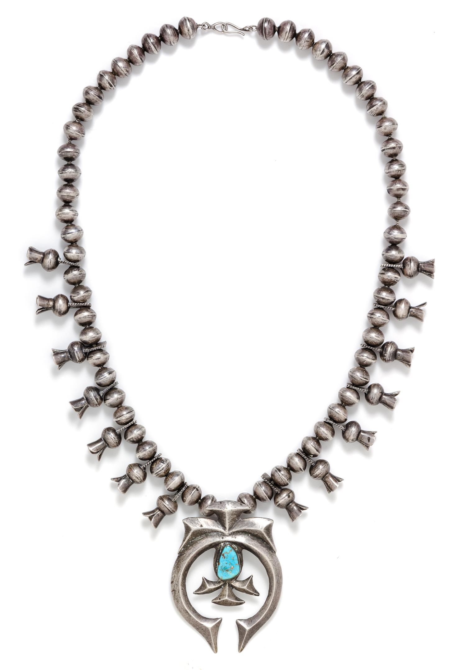 A Silver and Turquoise Squash Blossom Necklace, 150.70 dwts.