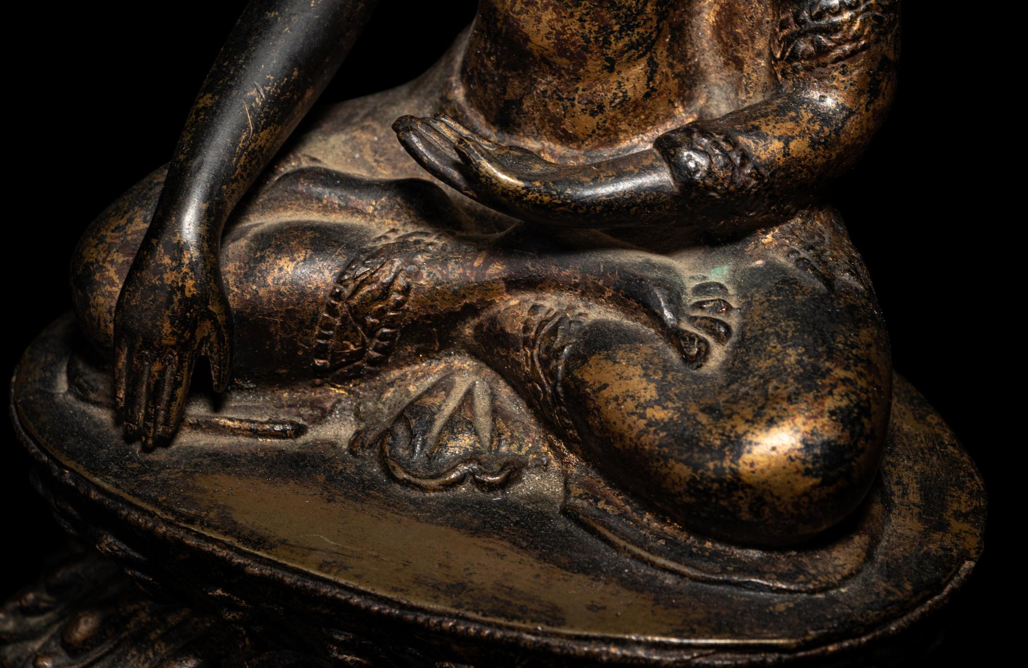 A Large Nepalese Gilt Bronze Figure of Seated Buddha