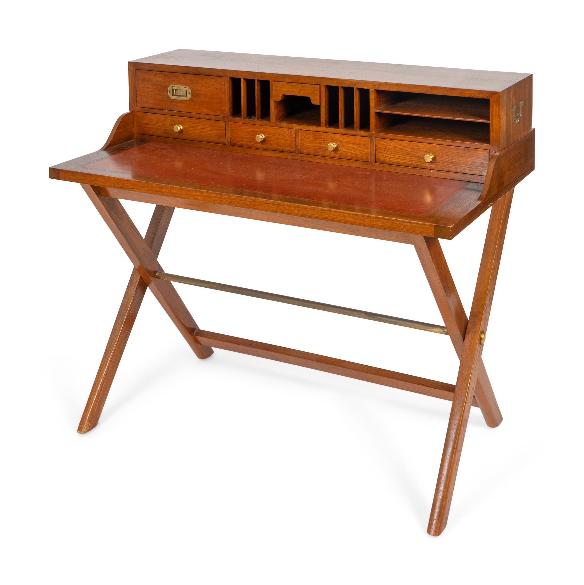 A Brass Mounted Teak Campaign Desk on X-Form Base — 20TH CENTURY