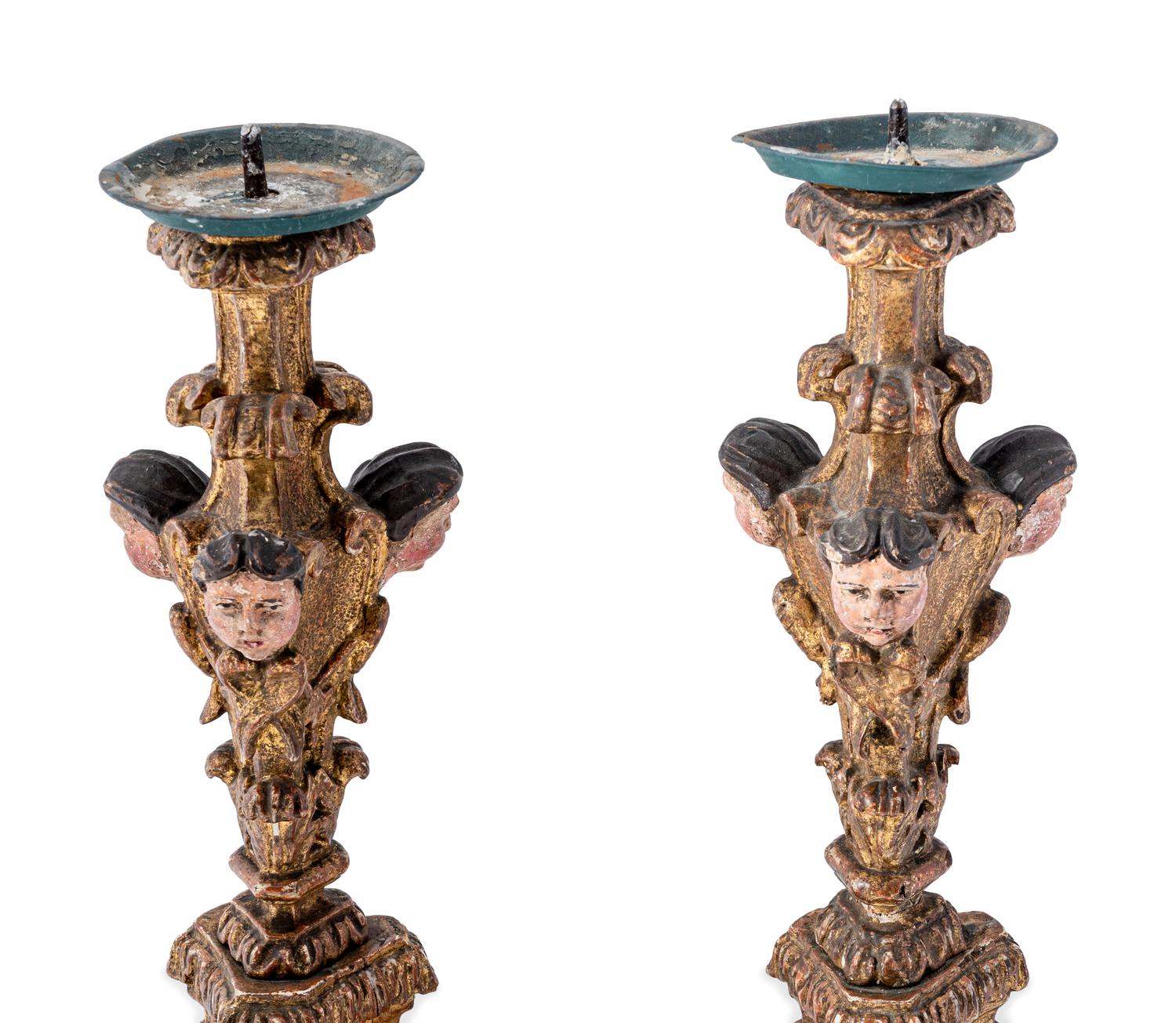 A Pair of Italian Baroque Gilt and Polychromed Pricket Sticks