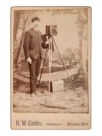 [EARLY PHOTOGRAPHY]. COOKS, H.W., photog. Cabinet card of a photographer with camera. Beverly, OH.