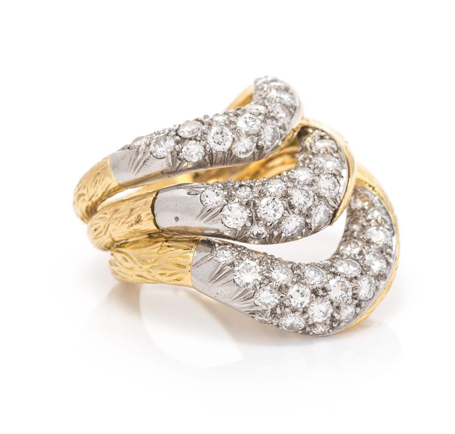 An 18 Karat Yellow Gold, Platinum and Diamond Triple Band, French, 7.65 dwts.
