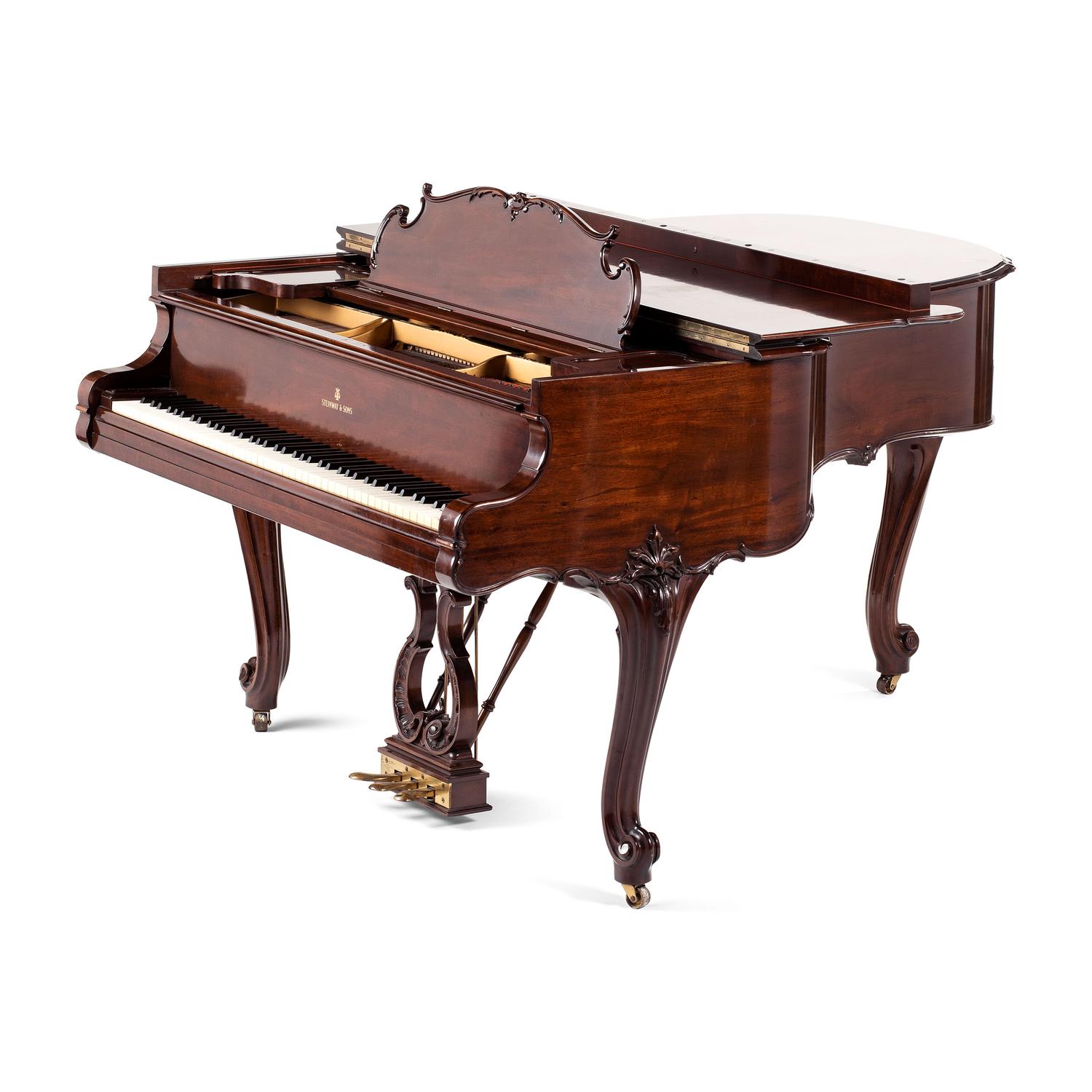A Steinway and Sons Louis XV Style Walnut Grand Piano