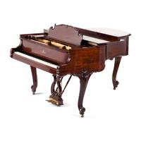 A Steinway and Sons Louis XV Style Walnut Grand Piano