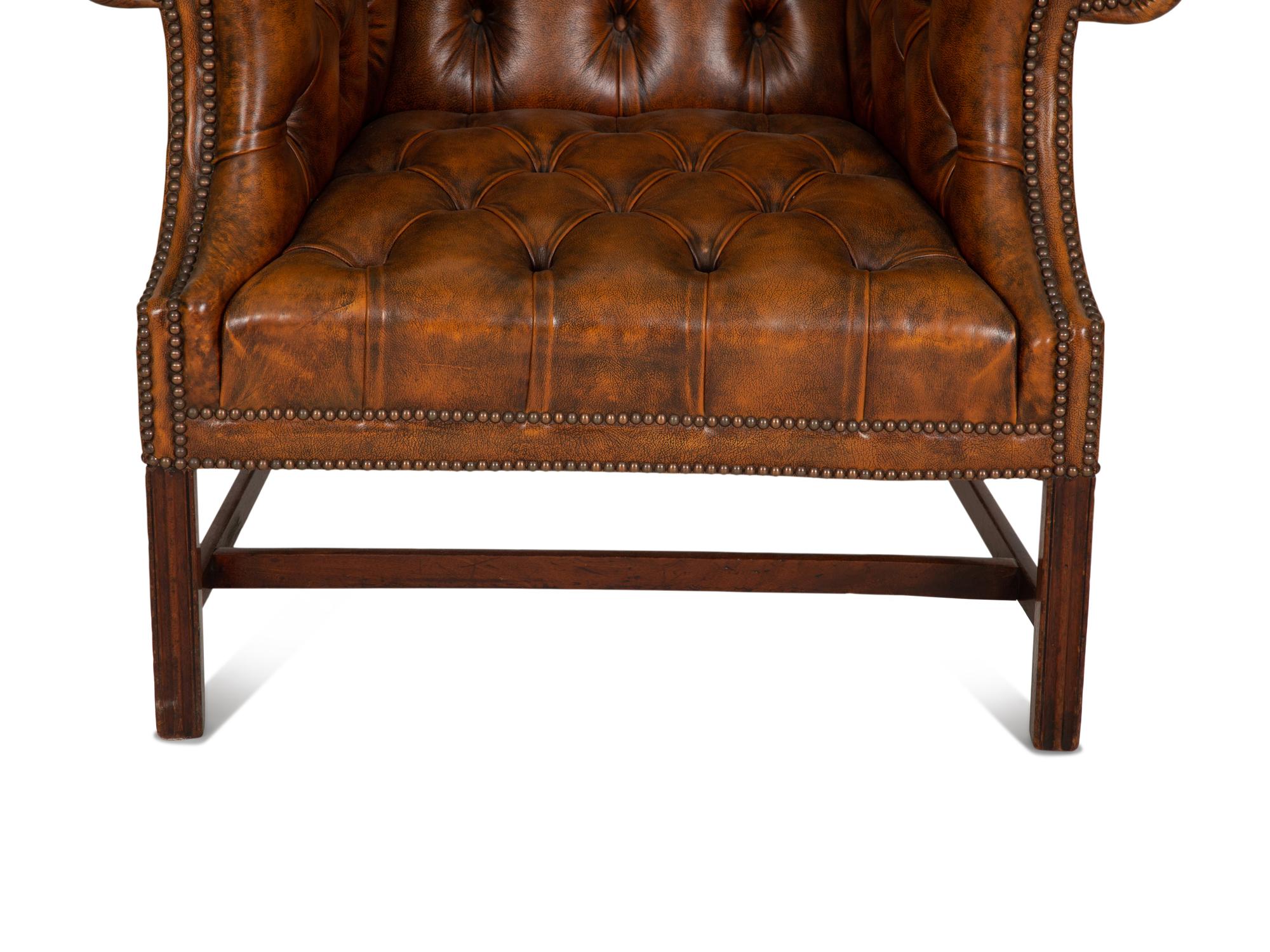 An English Leather-Upholstered Wingback Armchair