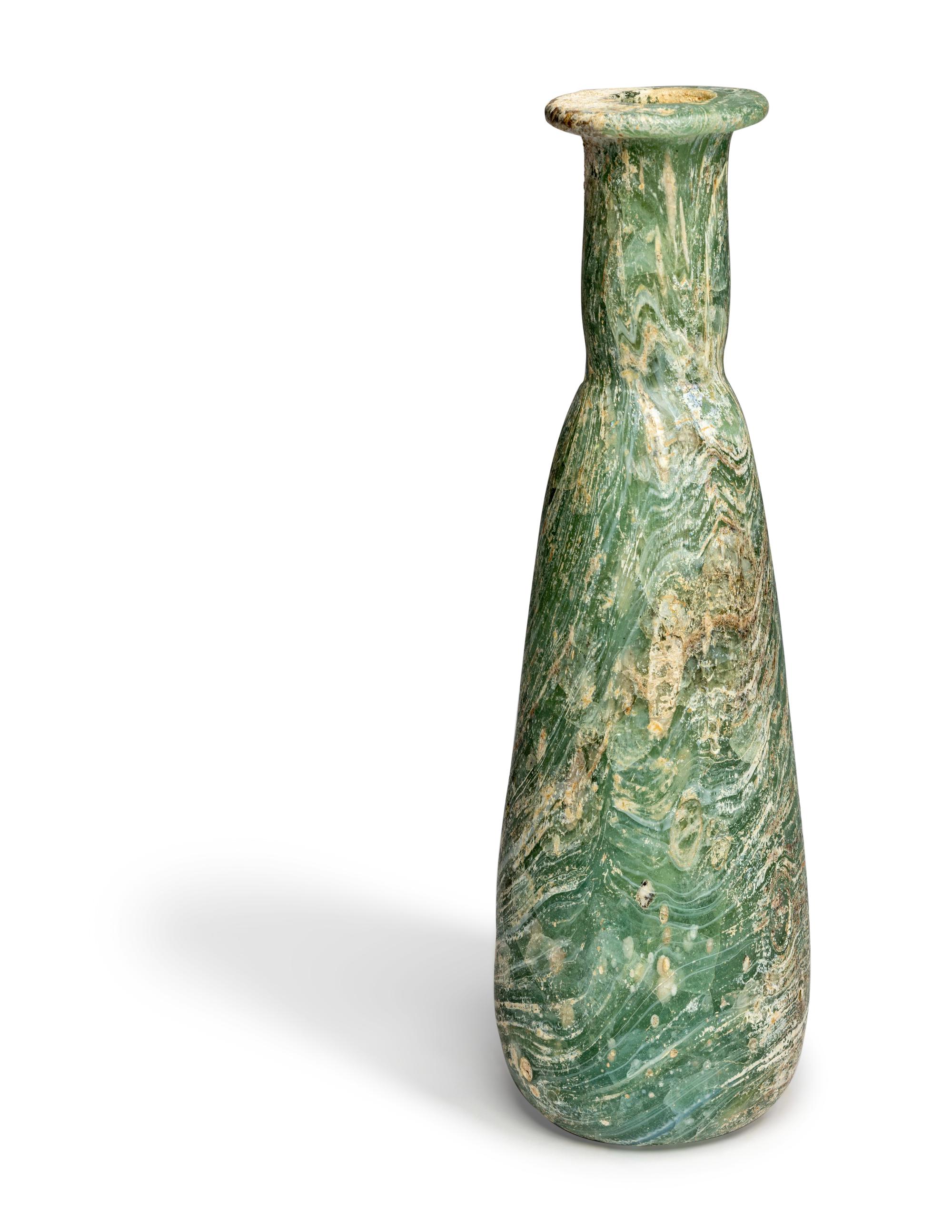 A Large Roman Marbled Glass Bottle