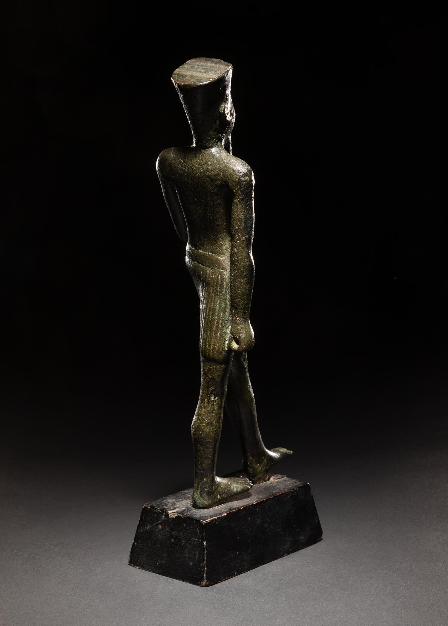 An Egyptian Bronze Figure of Amun