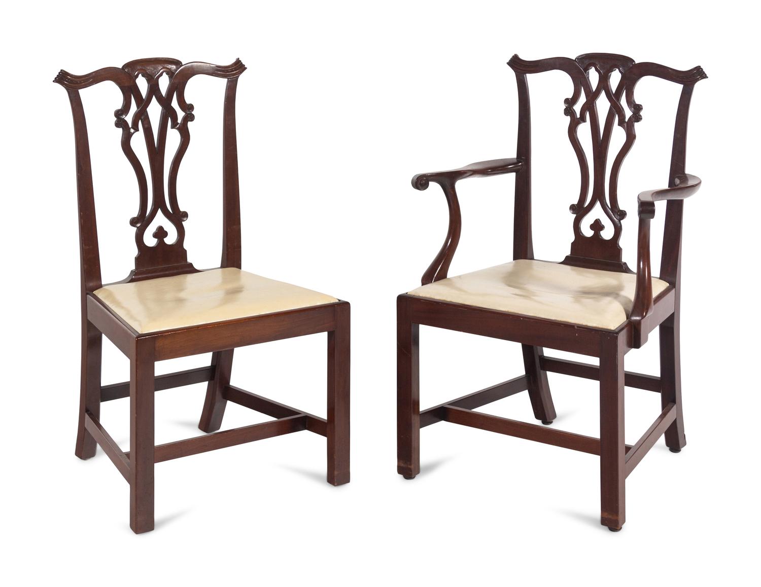 A Set of Twelve Chippendale Style Mahogany Dining Chairs