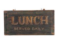 A 'Lunch Served Daily' Painted Wooden Sign
