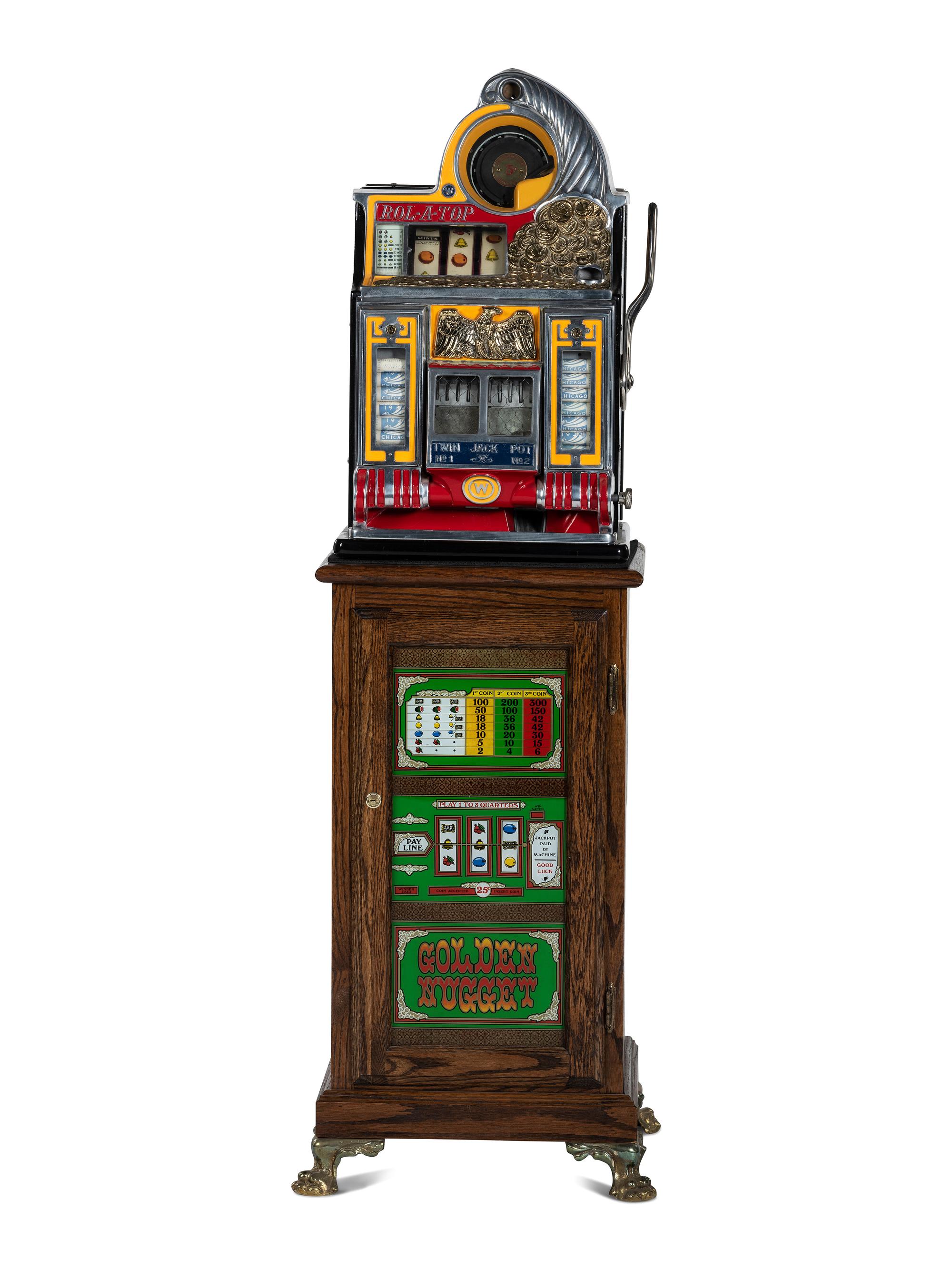 A 5 Cent Rol-A-Top Twin Jackpot Slot Machine on Reverse Printed Glass Inset Golden Nugget Stand