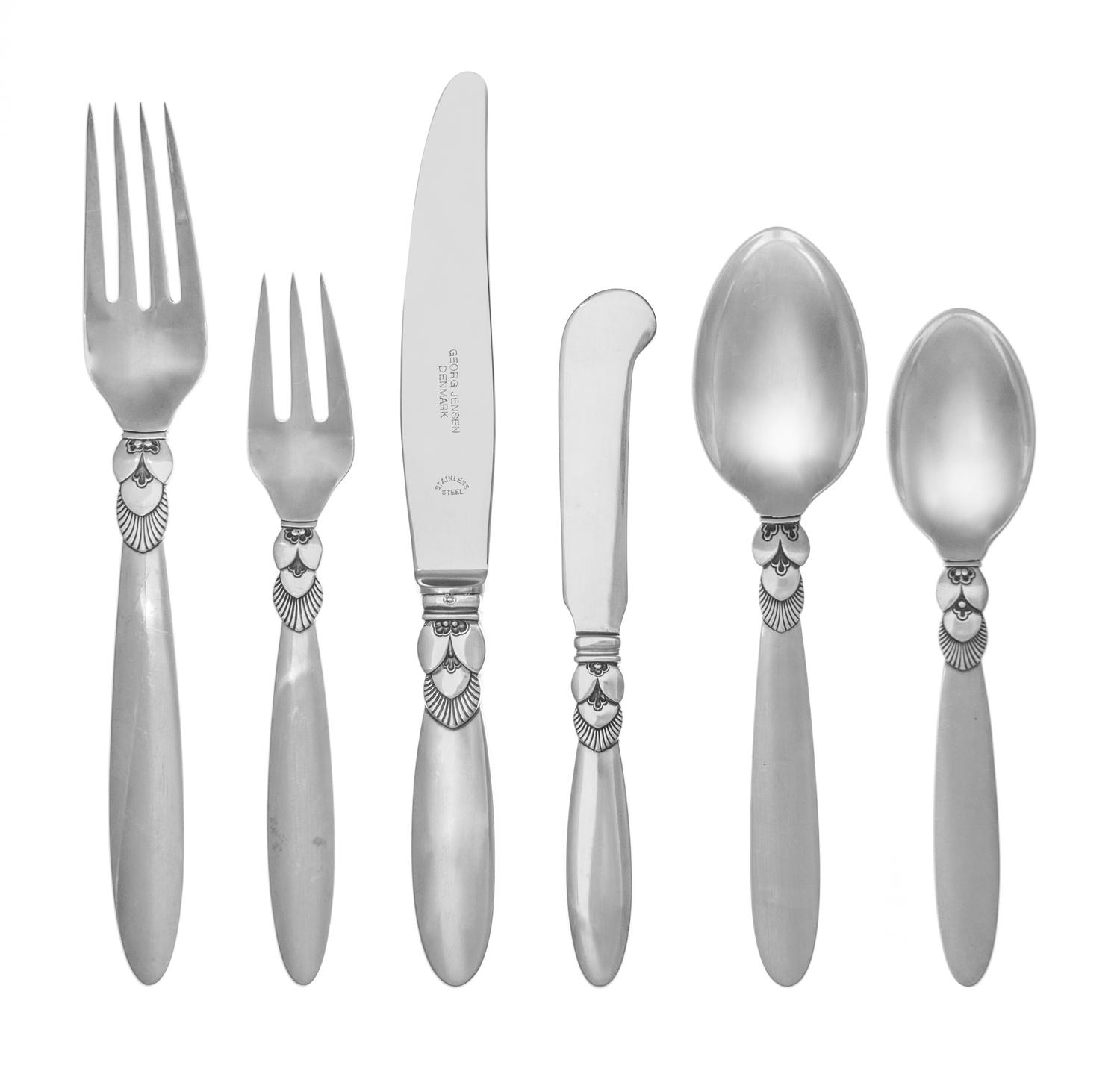 A Danish Silver Flatware Service, Georg Jensen Silversmithy, Copenhagen, 20th Century, Cactus pattern, comprising: 8 dinner knives 8 lu