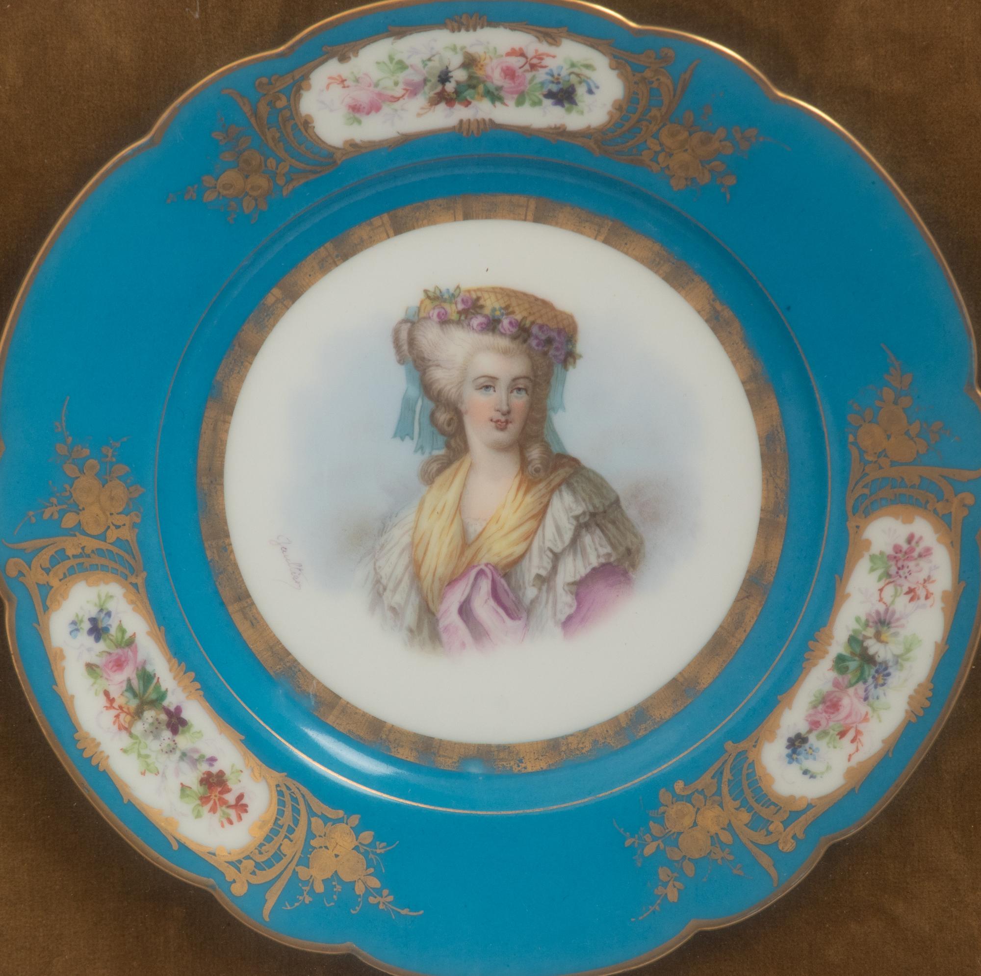 A Group of Seven Framed Sèvres Style Porcelain Plates