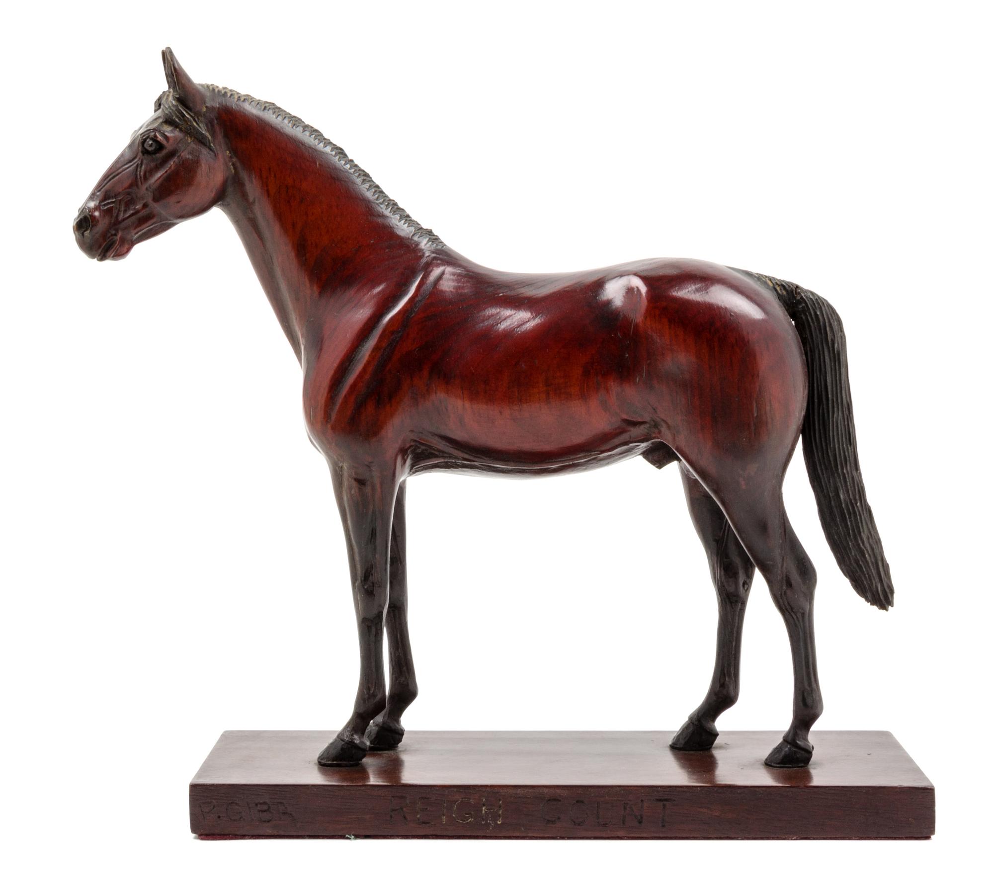 A Carved Wood Figure of a Thoroughbred Horse Height 11 1/2 inches. — PETER GIBA, 20TH CENTURY