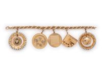 SOLD: YELLOW GOLD CHARM BRACELET