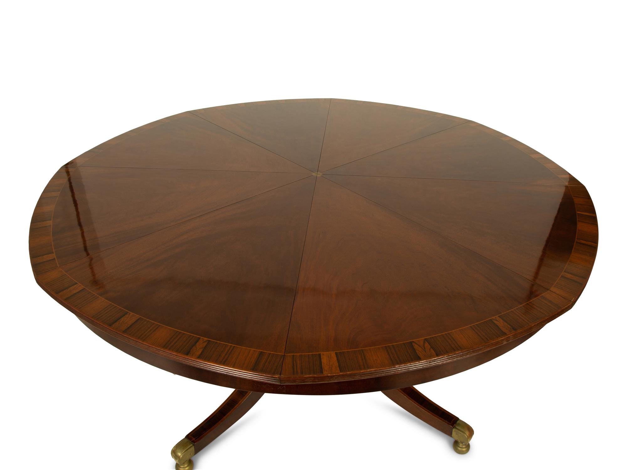 A Regency Style Mahogany "Jupe" Metamorphic Dining Table — 20TH CENTURY