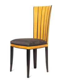 A Part-Ebonized Birch Dining Set