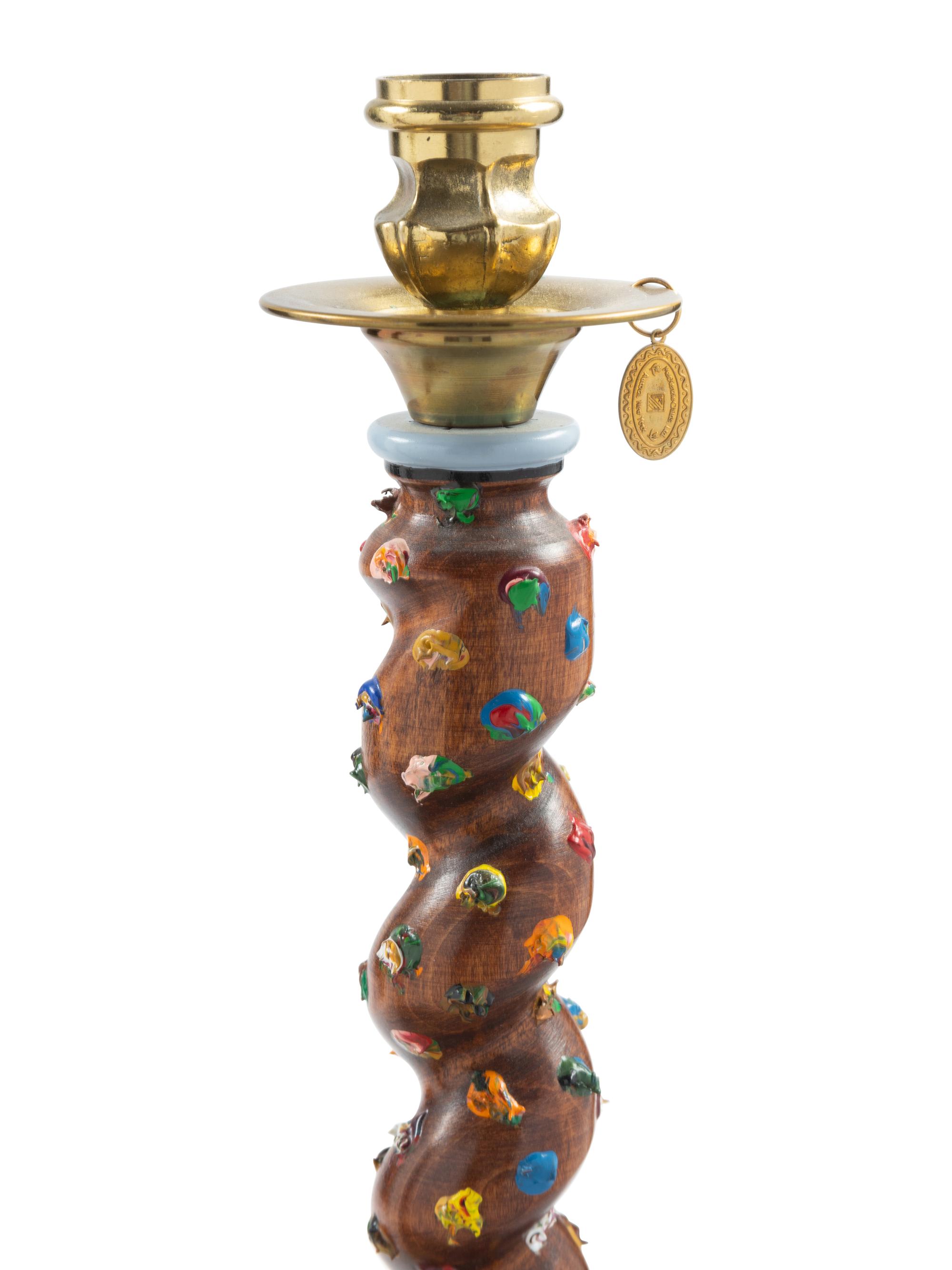 A Pair of MacKenzie-Childs Carved Wood and Ceramic-Mounted Candlesticks
