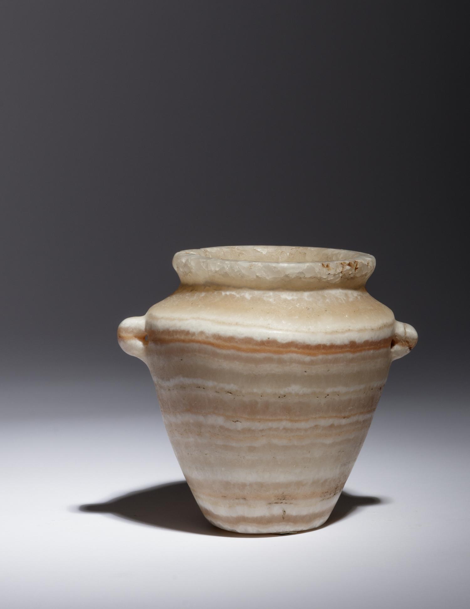 An Egyptian Alabaster Lug Handled Jar