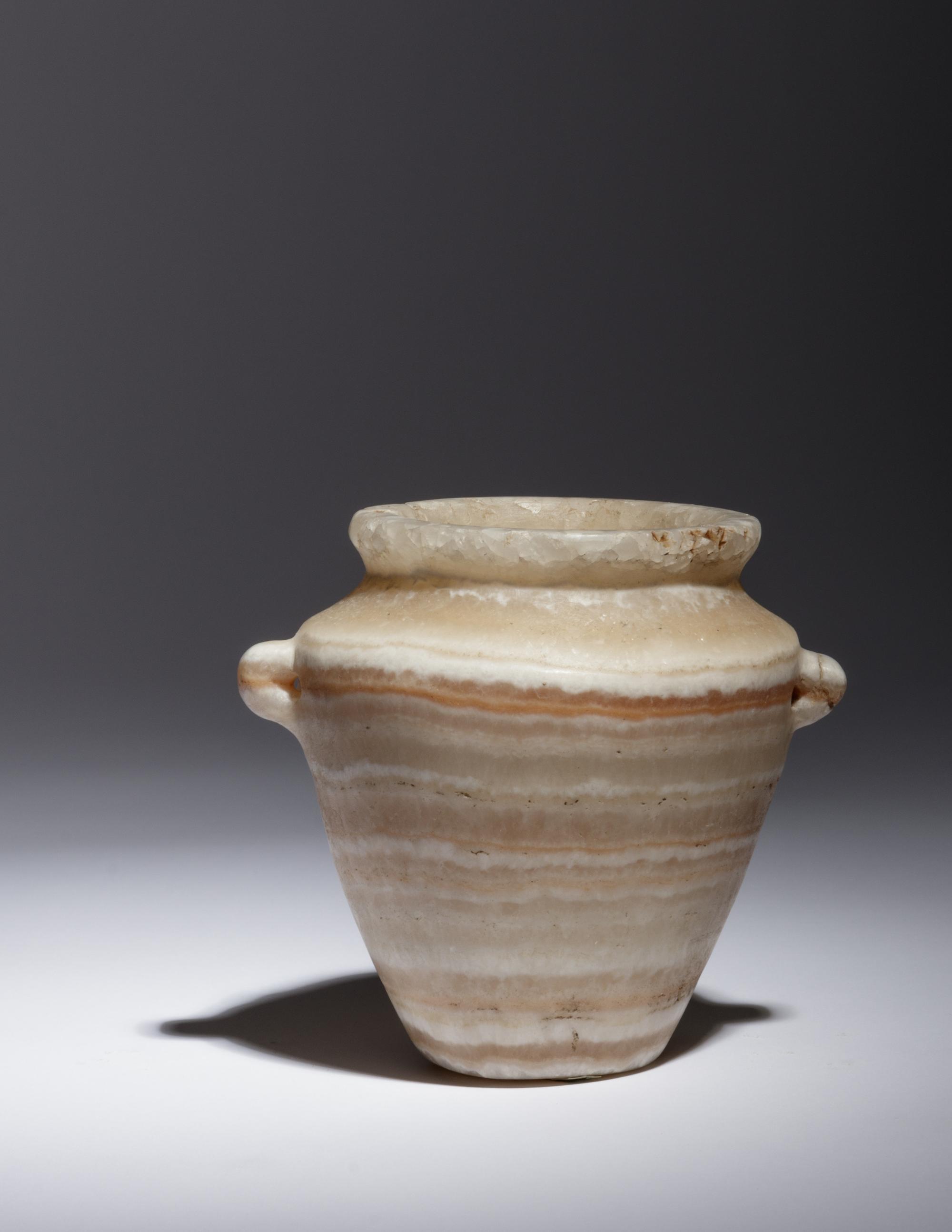 An Egyptian Alabaster Lug Handled Jar