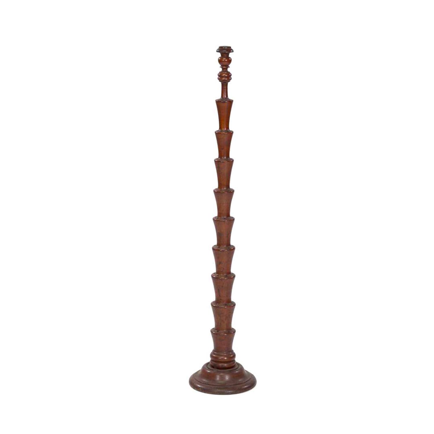[FLAGS]. A turned wooden flag tree stand. Late 19th-early 20th century.