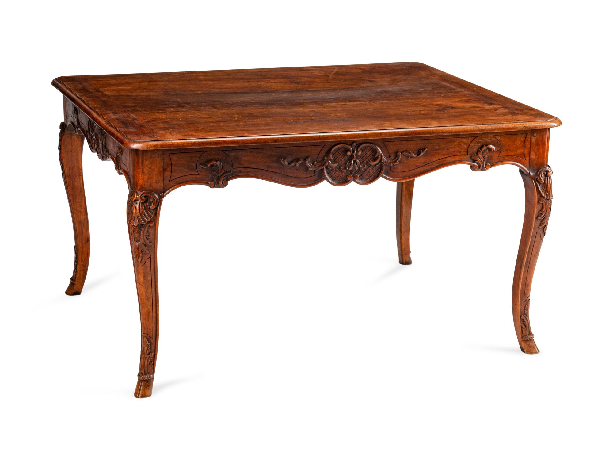 A Louis XV Style Carved Walnut Table — 19TH CENTURY