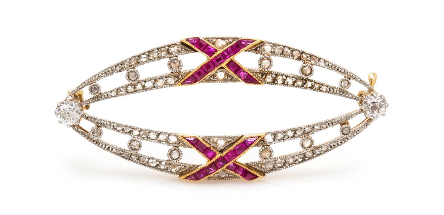 A Platinum Topped Yellow Gold, Diamond and Ruby Brooch, 3.60 dwts.