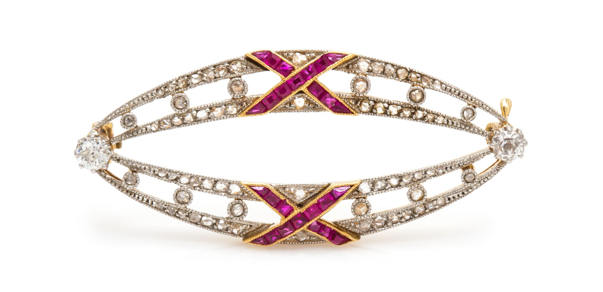 A Platinum Topped Yellow Gold, Diamond and Ruby Brooch, 3.60 dwts.