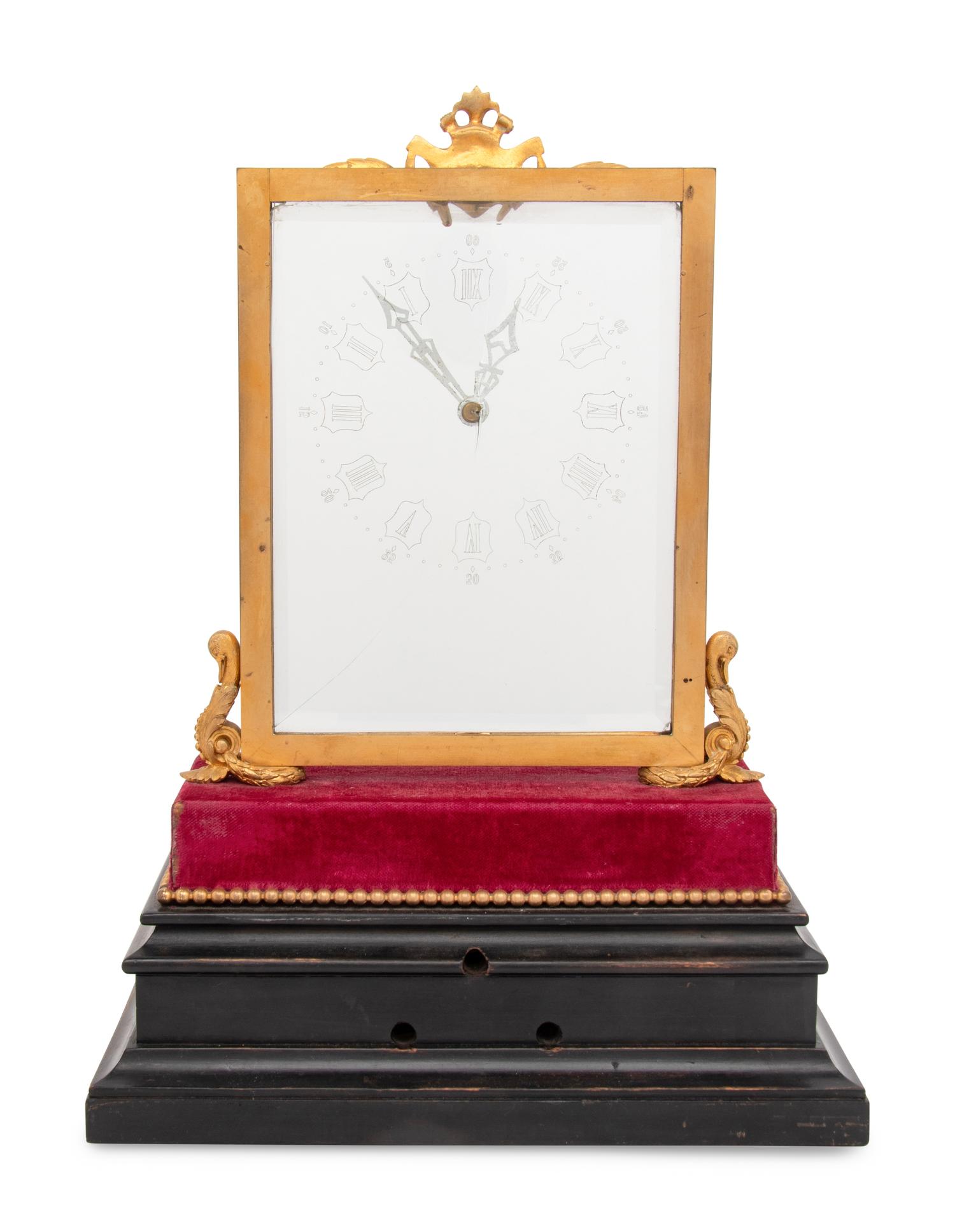 A French Gilt-Bronze Mounted Mystery Clock
