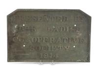 A Group of Eleven Advertising Plaques, Boxes, Jars and Pamphlets