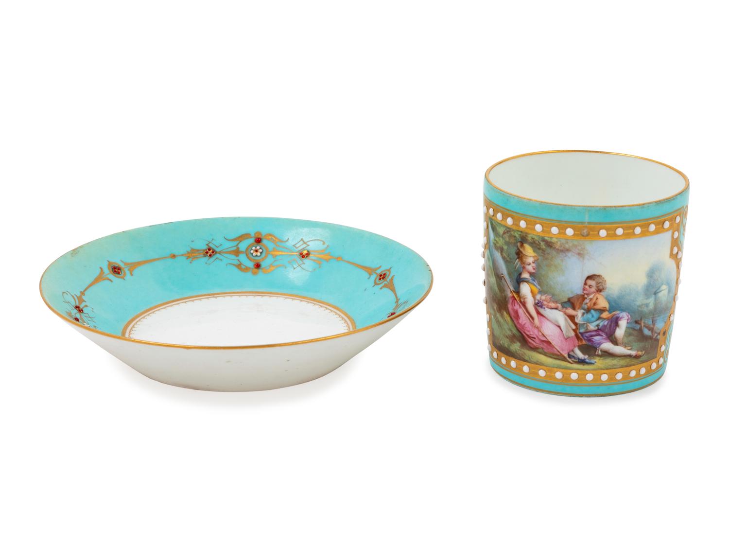 A Sèvres Style "Jeweled" Porcelain Cup and Saucer