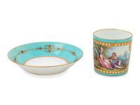 A Sèvres Style "Jeweled" Porcelain Cup and Saucer
