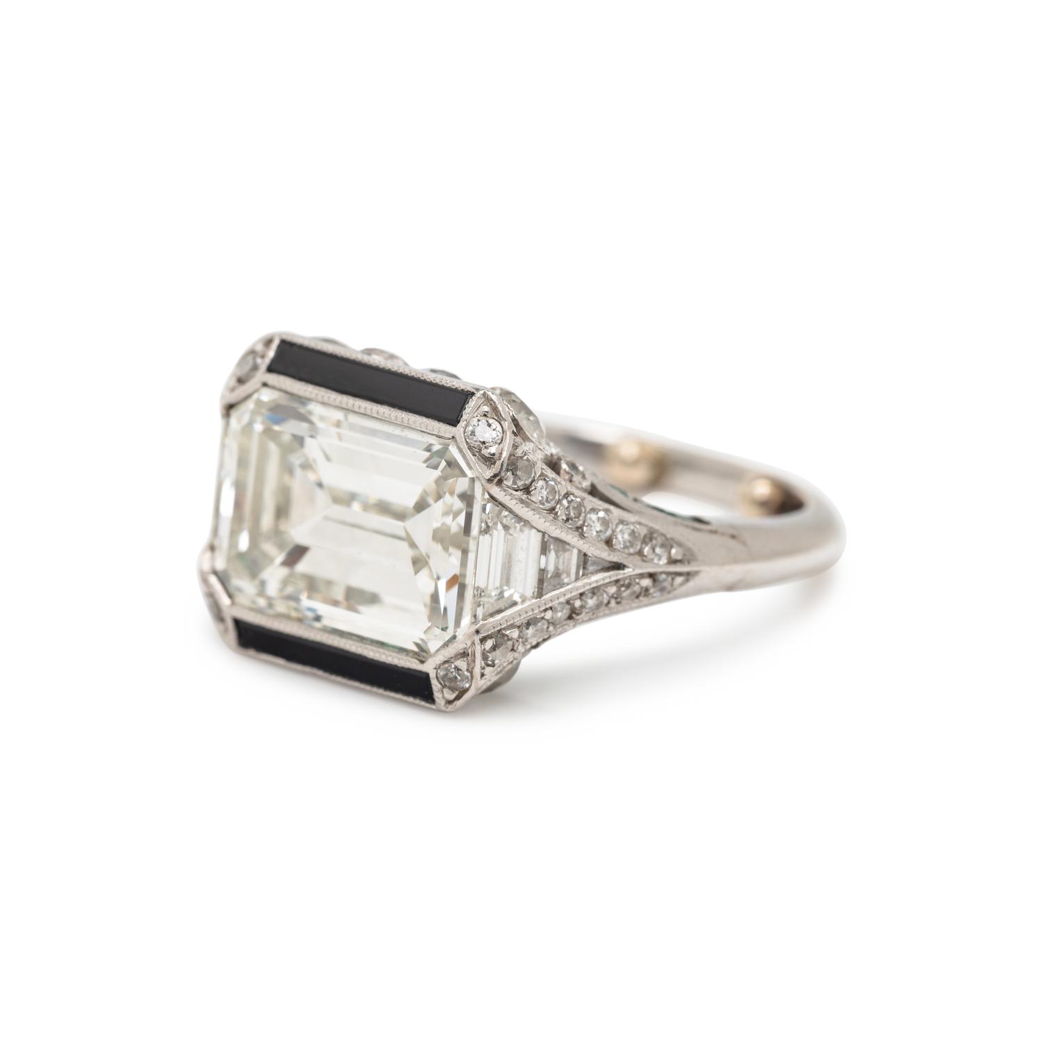 CARTIER, LONDON, ART DECO, PLATINUM AND DIAMOND RING
