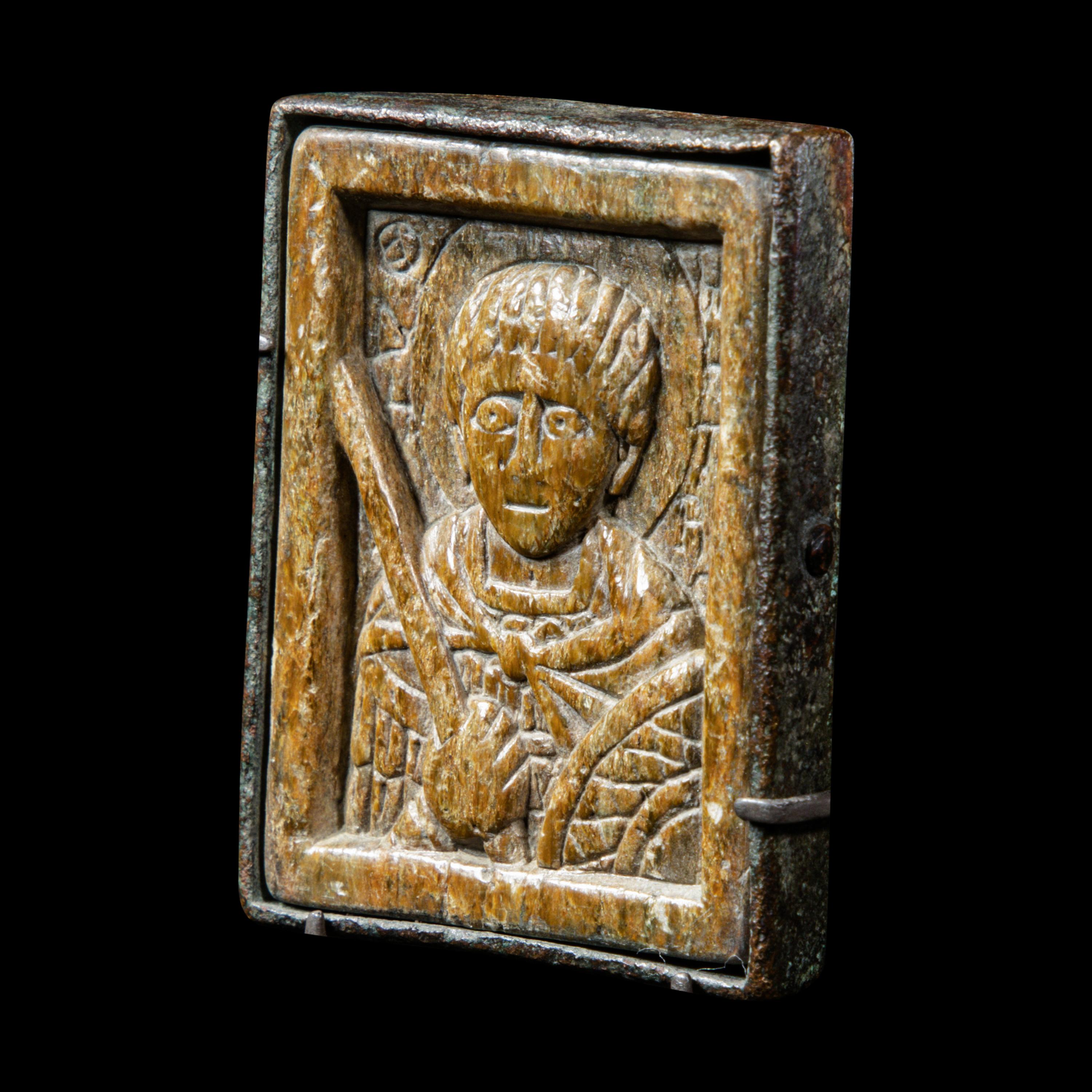 A Byzantine Bronze and Steatite Plaque with Saint Demetrios