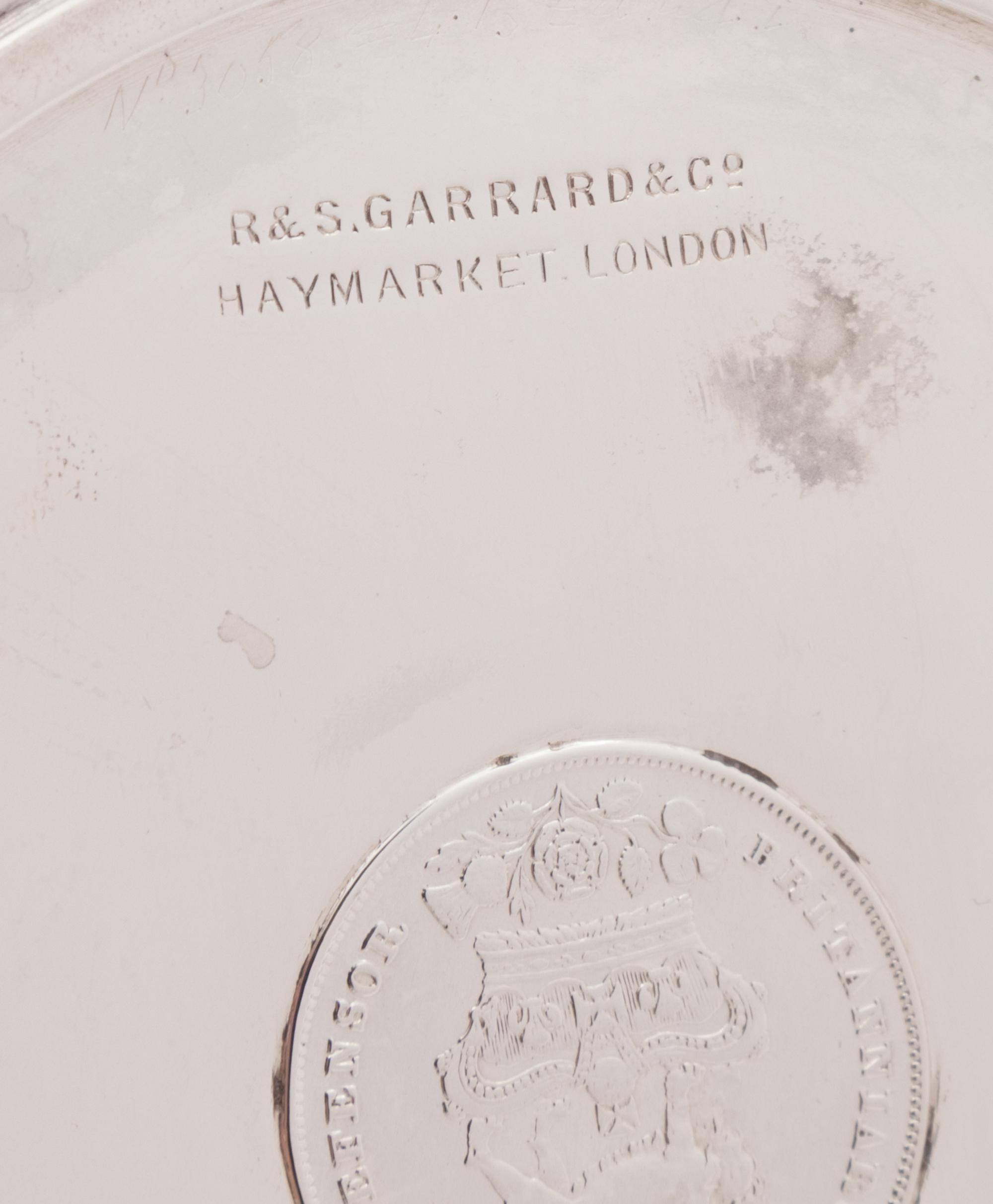 A Pair of Edwardian Silver Coin-Inset Dishes