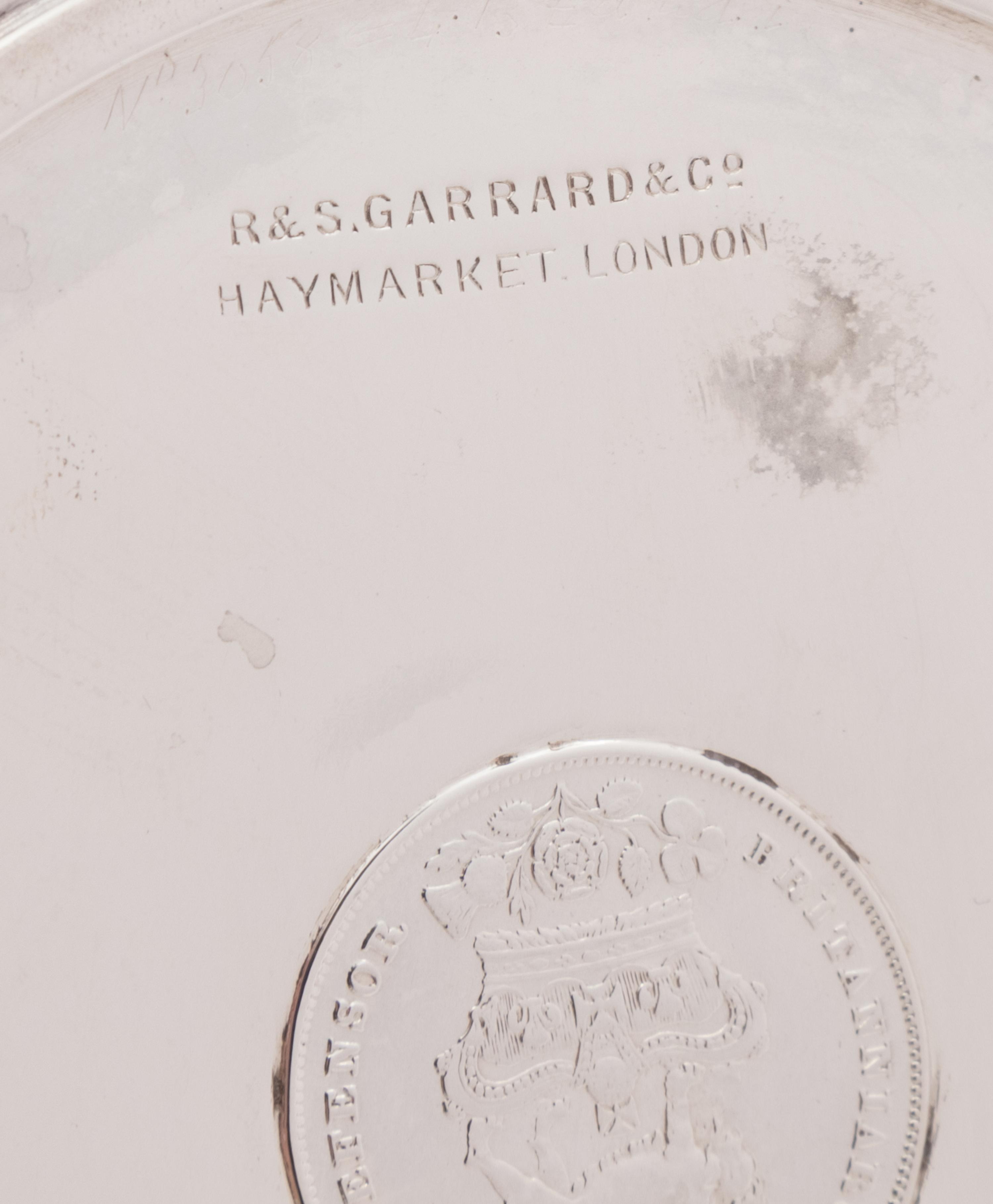 A Pair of Edwardian Silver Coin-Inset Dishes