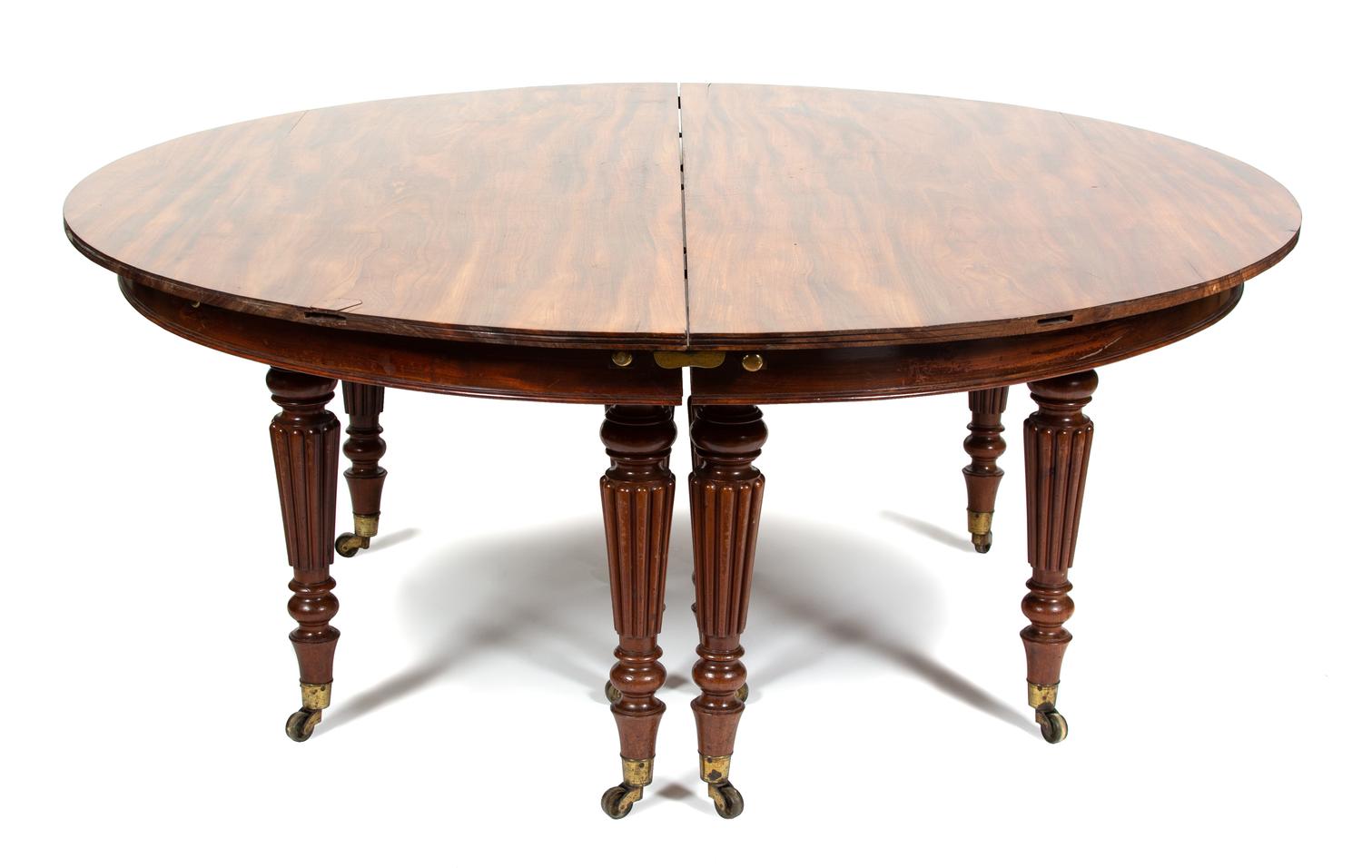 A William IV Style Mahogany Circular Dining Table with Perimeter Extensions Height 28 1/2 inches x diameter 70, with extensions 94 inch — LATE 19TH CENTURY