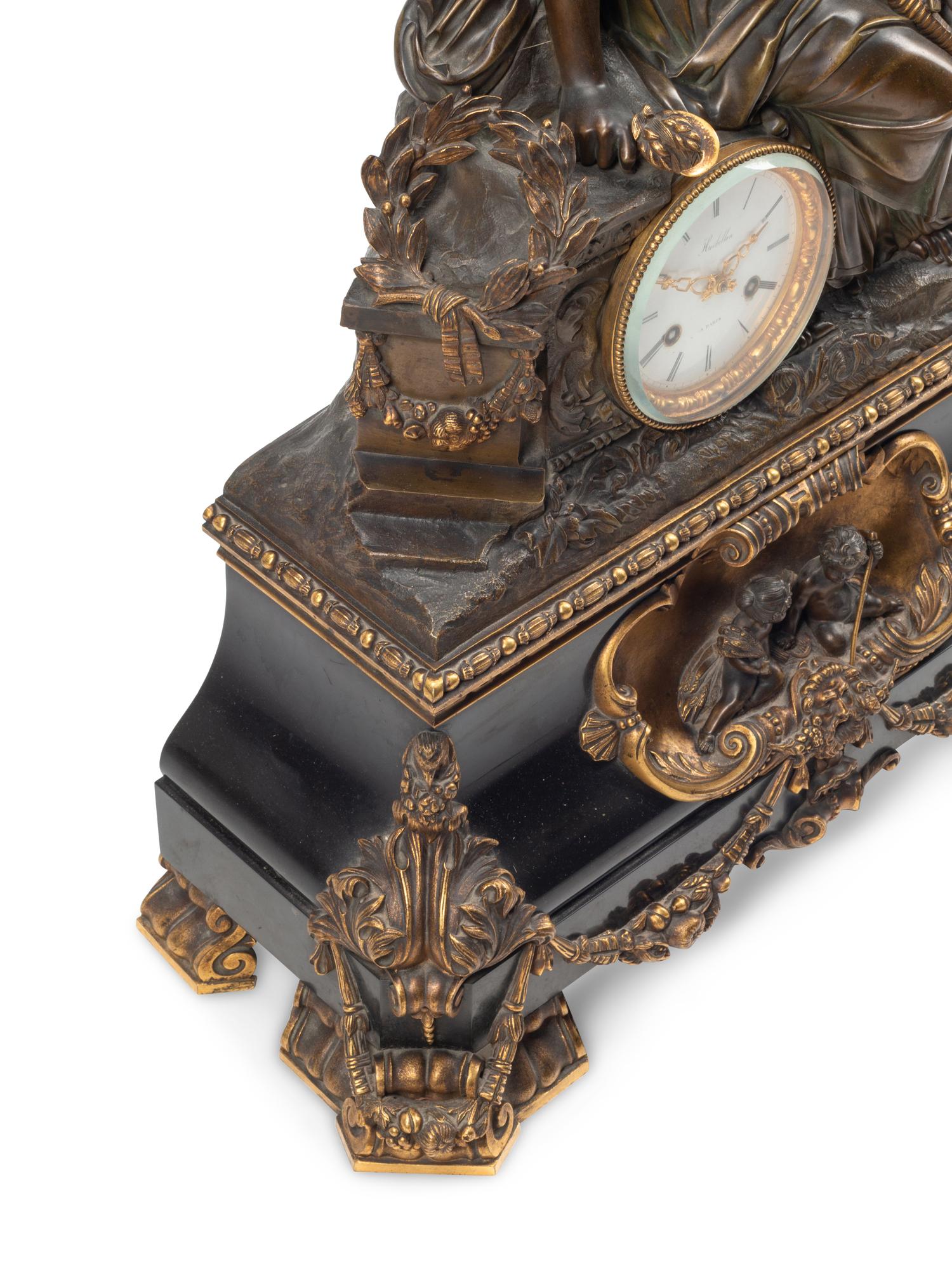 A French Bronze and Slate Figural Mantel Clock