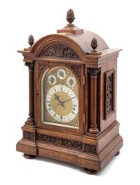 A Black Forest Oak Bracket Clock Height 20 x width 14 3/4 x depth 10 inches. — WINTERHALDER & HOFMEIER, LATE 19TH CENTURY