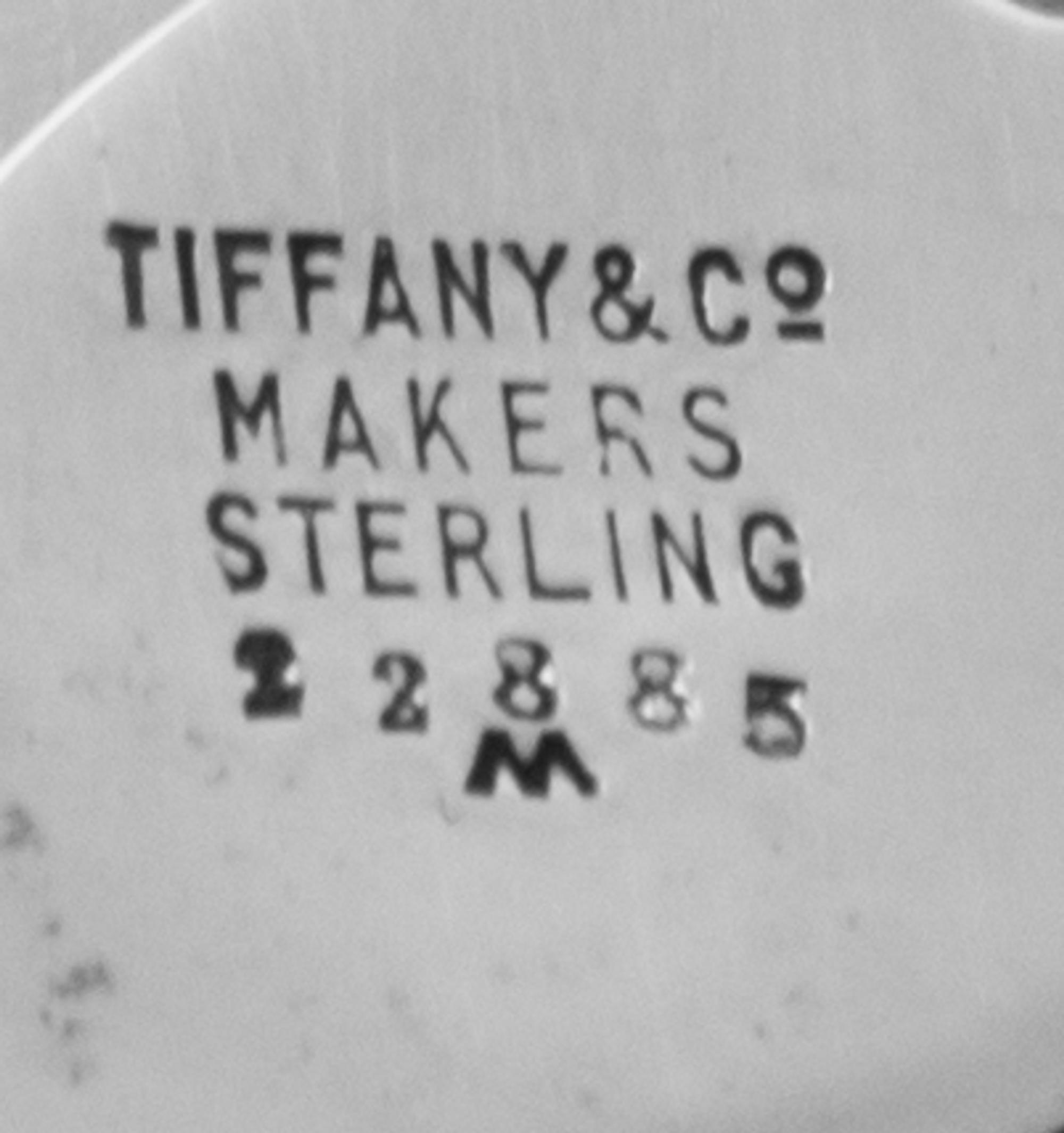 Two American Silver Dishes, Tiffany & Co., New York, NY, Circa 1914/Circa 1950, comprising an octagonal dish, the paneled sides etched