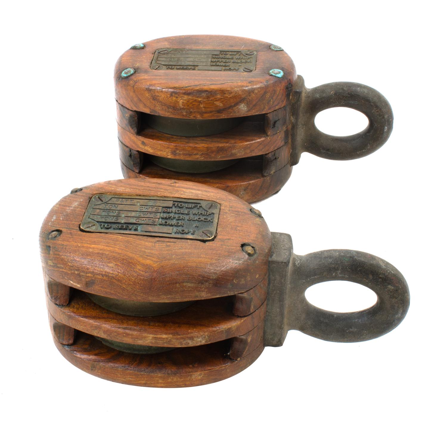 Two Metal and Wood Pulley Blocks Height of larger 10 inches. — LATE 19TH/EARLY 20TH CENTURY