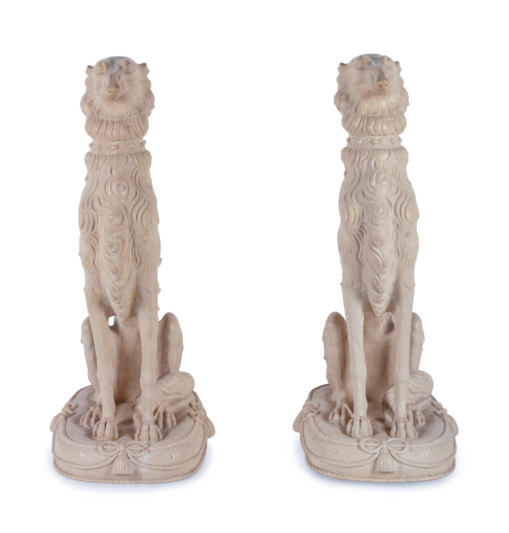 A Pair of Resin Models of Seated Hounds