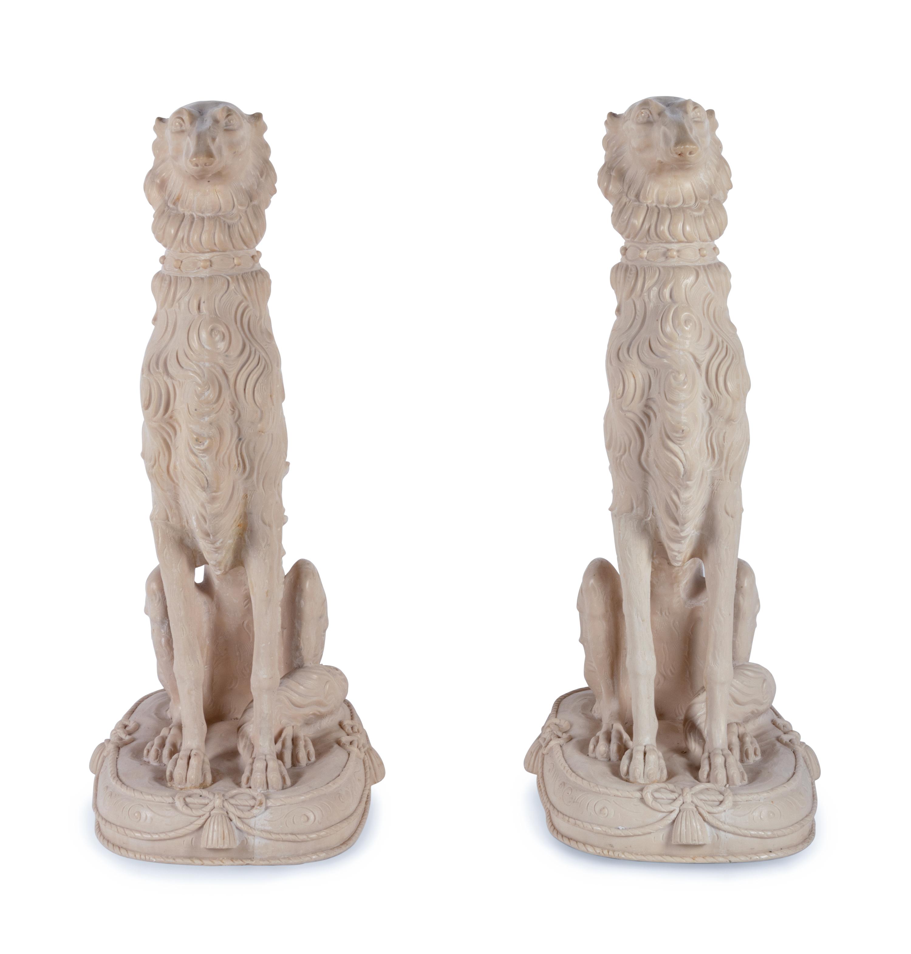 A Pair of Resin Models of Seated Hounds
