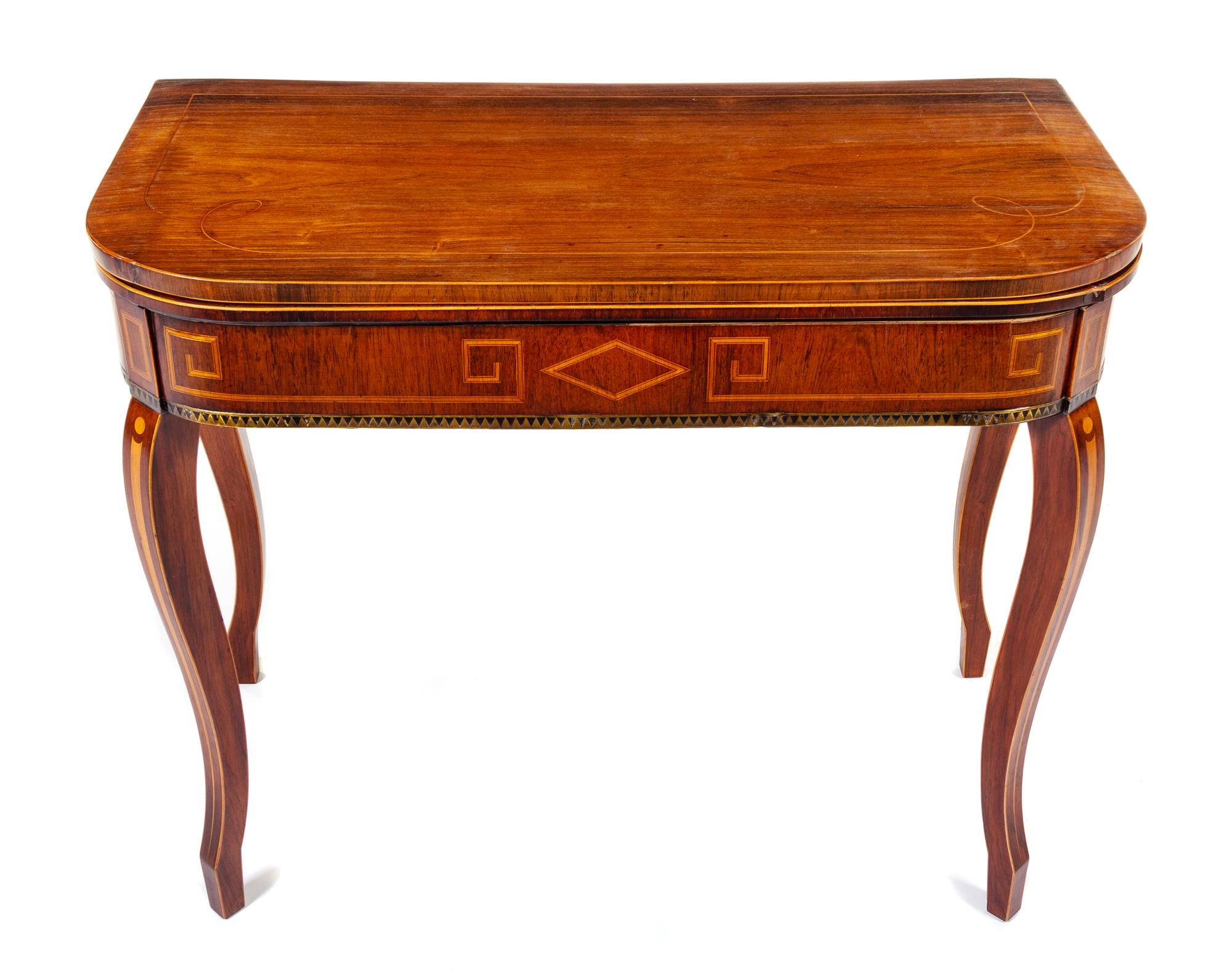 A Continental Mahogany Flip-Top Table Height 28 1/2 x width 36 x depth 17 1/2 inches. — 19TH CENTURY