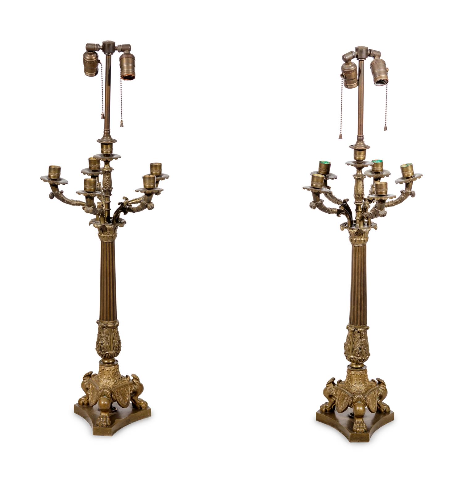A Pair of Empire Style Gilt and Patinated Bronze Candelabra Mounted as Lamps