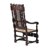 A William and Mary Swan-and-Leaf Carved and Cane Upholstered Oak Armchair