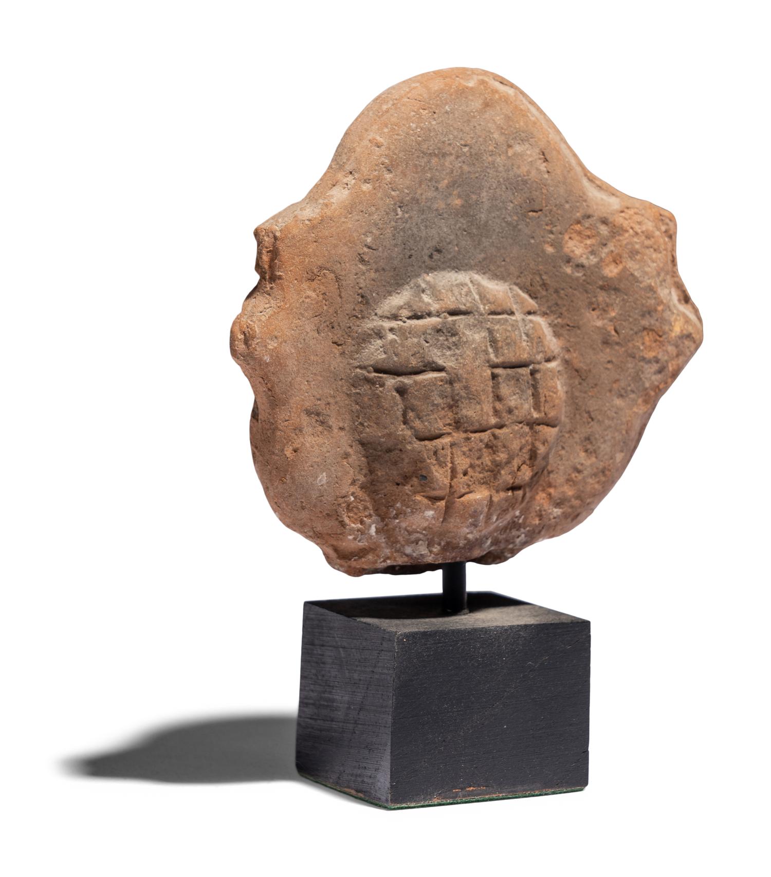An Egyptian Terracotta Head of a Goddess