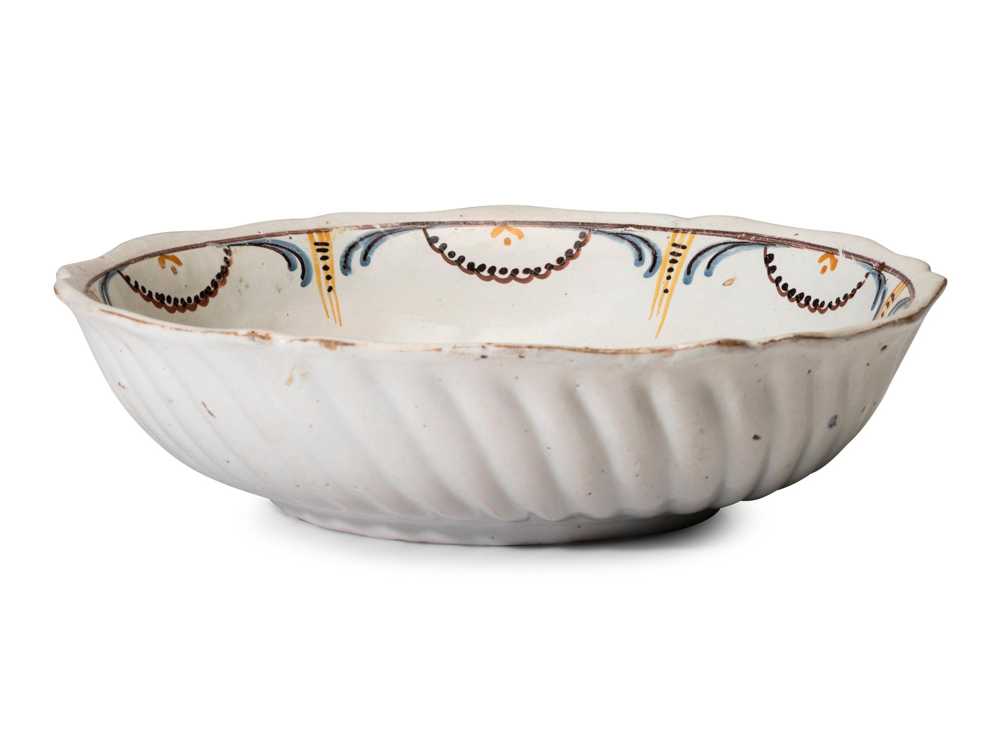 A Dutch Polychrome Glazed Delftware Bowl