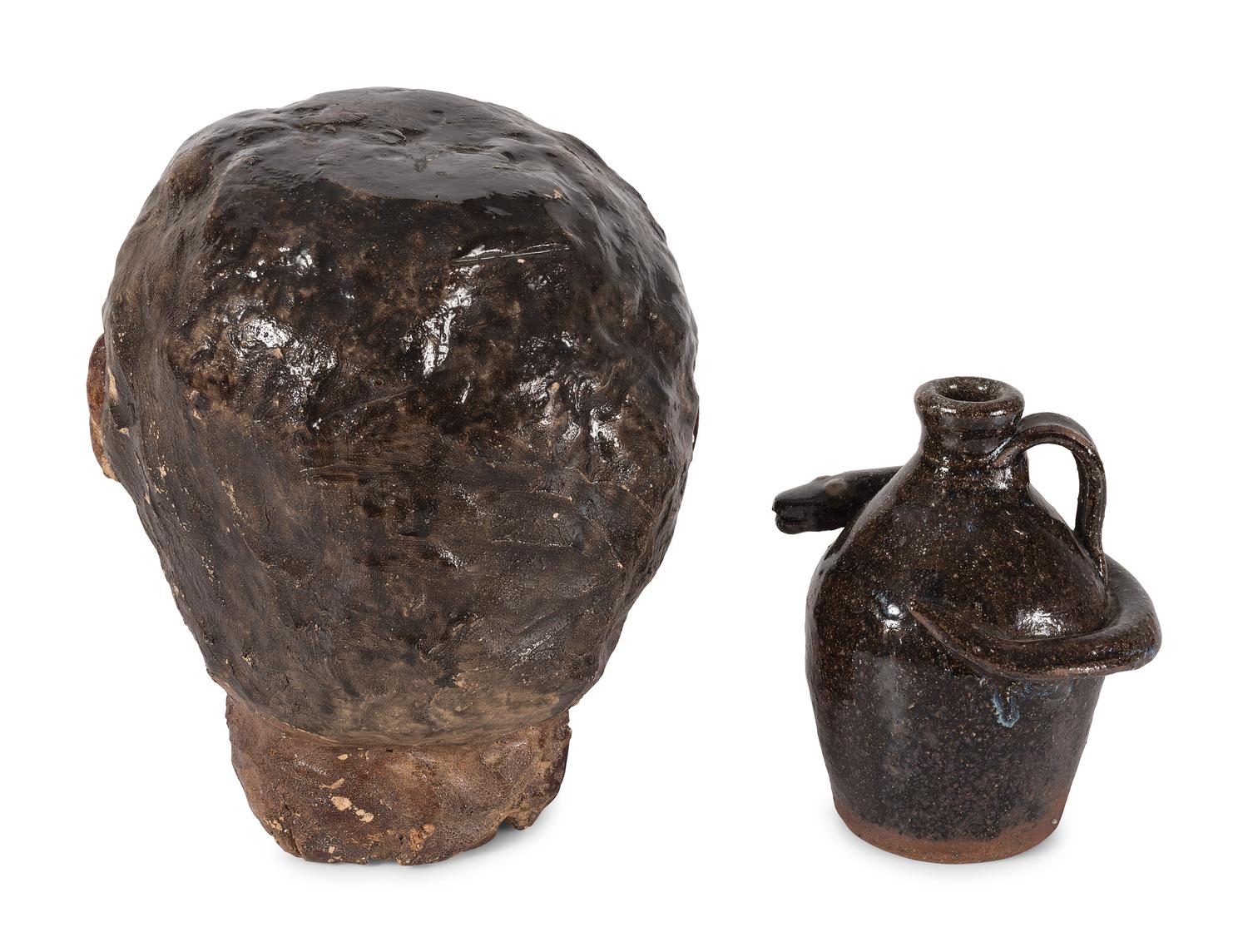 A Folk Art Glazed Stoneware Head and a Stoneware Snake Jug by Burlon B. Craig (1914-2002)