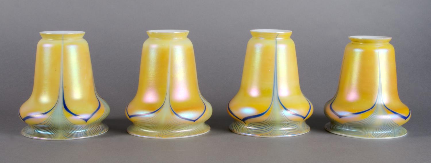 A Set of Four Iridescent Glass Shades, Quezal or Steuben, Height 5 1/4 inches.